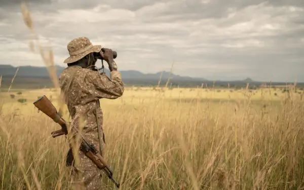 a ugandan tour guide during our Uganda and East Africa safaris